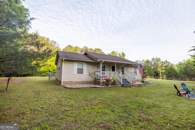 single story home with a porch, a front lawn, fence, and crawl space