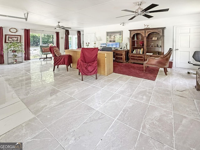 living room with a ceiling fan
