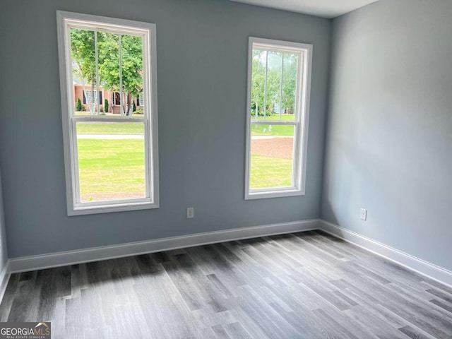 154 Pope Paul Path, Dallas, GA 30132 - spare room featuring wood finished floors and baseboards