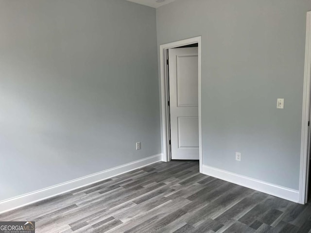 154 Pope Paul Path, Dallas, GA 30132 - empty room with baseboards and dark wood finished floors