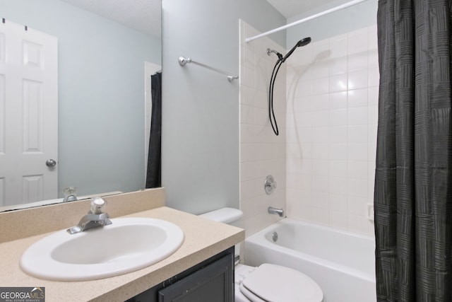 bathroom with vanity, toilet, and shower / tub combo with curtain