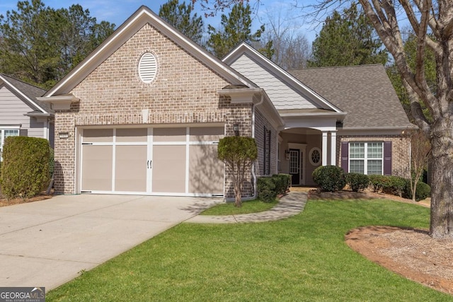 6408 Autumn Crest Ln, Hoschton, GA 30548 - view of front of property featuring brick siding, an attached garage, driveway, and a front yard