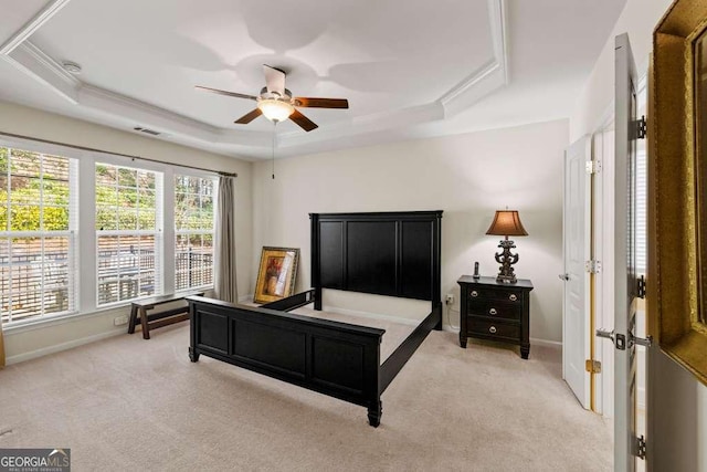 6408 Autumn Crest Ln, Hoschton, GA 30548 - bedroom with light colored carpet, a raised ceiling, baseboards, and ceiling fan