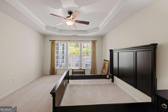 6408 Autumn Crest Ln, Hoschton, GA 30548 - bedroom featuring light carpet, a tray ceiling, crown molding, baseboards, and a ceiling fan