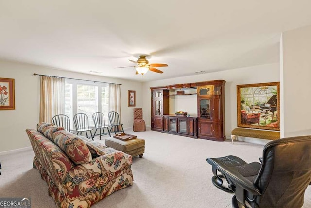 6408 Autumn Crest Ln, Hoschton, GA 30548 - living area featuring carpet, ceiling fan, and baseboards