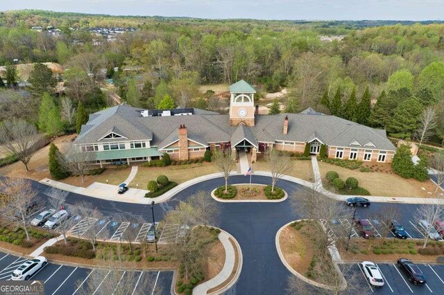 6408 Autumn Crest Ln, Hoschton, GA 30548 - aerial view of property and surrounding area with a forest