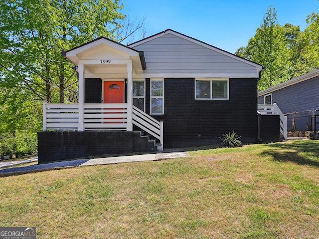 1599 Ezra Church Dr NW, Atlanta, GA 30314 - bungalow-style house featuring a front lawn