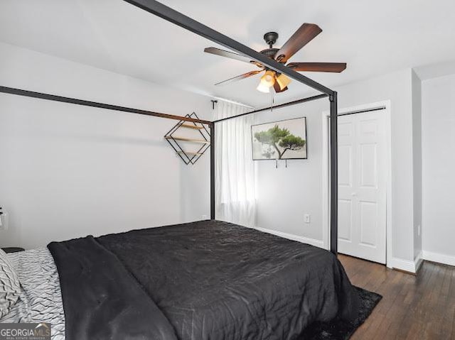 1599 Ezra Church Dr NW, Atlanta, GA 30314 - bedroom featuring baseboards, a ceiling fan, and wood finished floors