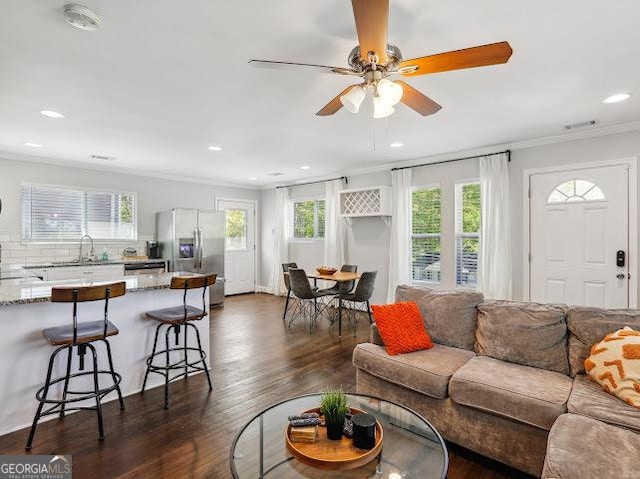 1599 Ezra Church Dr NW, Atlanta, GA 30314 - living area with recessed lighting, ceiling fan, plenty of natural light, and dark wood-type flooring