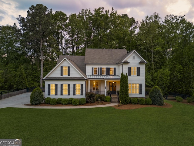 15626 Birmingham Hwy, Milton, GA 30004 - view of front of house with concrete driveway, a porch, and a front lawn