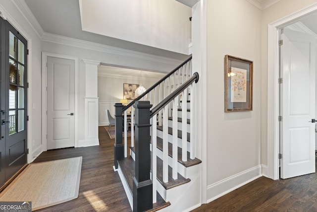 15626 Birmingham Hwy, Milton, GA 30004 - foyer entrance with stairway, an inviting chandelier, crown molding, and dark wood finished floors