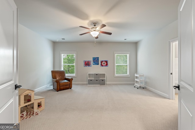 15626 Birmingham Hwy, Milton, GA 30004 - living area with carpet floors, baseboards, and a ceiling fan