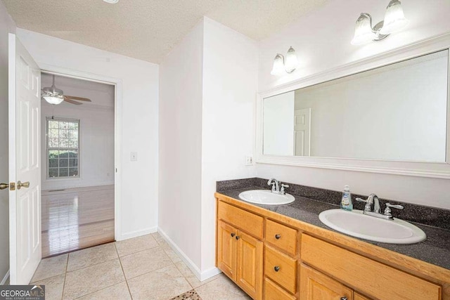 220 Yellowbird Trl Unit 40, Blue Ridge, GA 30513 - bathroom featuring double vanity, a sink, baseboards, and tile patterned flooring