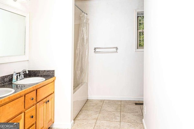 220 Yellowbird Trl Unit 40, Blue Ridge, GA 30513 - full bath with double vanity, shower / tub combo, a sink, tile patterned floors, and baseboards