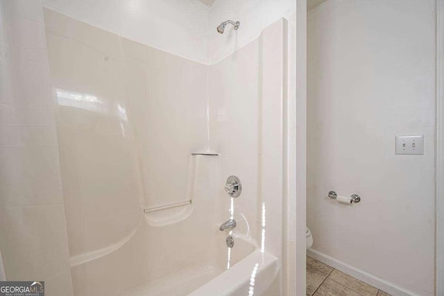 220 Yellowbird Trl Unit 40, Blue Ridge, GA 30513 - full bathroom featuring toilet, tile patterned floors, washtub / shower combination, and baseboards