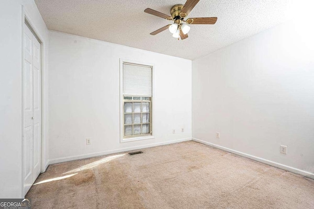 220 Yellowbird Trl Unit 40, Blue Ridge, GA 30513 - unfurnished bedroom featuring a textured ceiling, visible vents, baseboards, and carpet