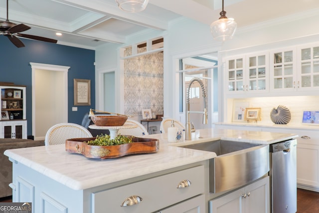kitchen with a ceiling fan, stainless steel dishwasher, beam ceiling, coffered ceiling, and white cabinetry