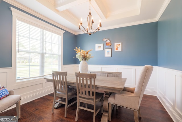 dining area with an inviting chandelier, a decorative wall, wainscoting, and a healthy amount of sunlight