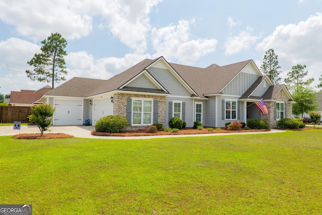 craftsman inspired home featuring board and batten siding, a garage, fence, a front lawn, and concrete driveway