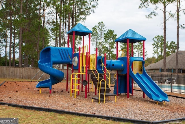 community play area featuring fence
