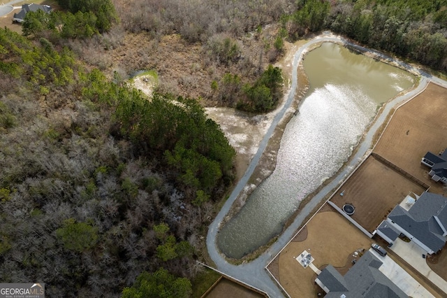 drone / aerial view with a water view