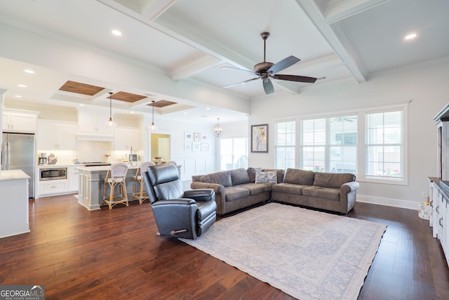 living room featuring a ceiling fan, beamed ceiling, dark wood finished floors, and coffered ceiling
