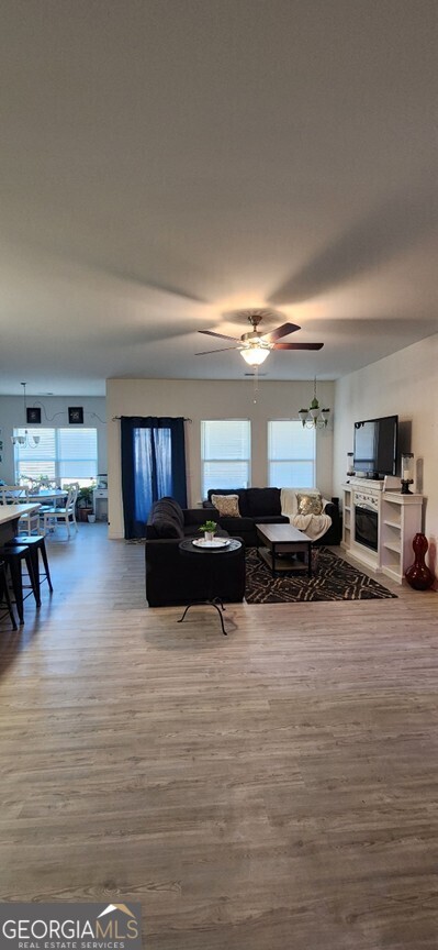 77 Willowrun Dr SW, Rome, GA 30165 - living area featuring a ceiling fan and wood finished floors