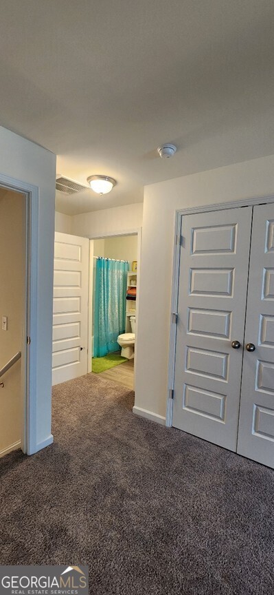 77 Willowrun Dr SW, Rome, GA 30165 - hallway with carpet flooring and baseboards