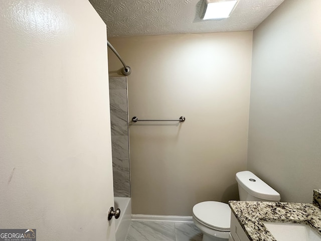 full bath with vanity, toilet, a textured ceiling, marble finish floor, and shower / bath combination