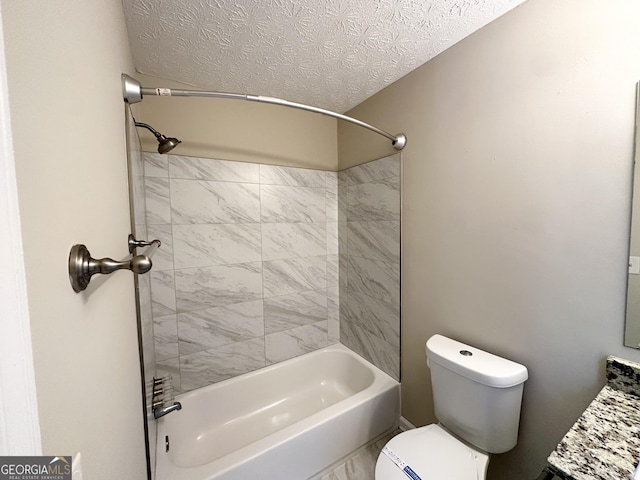 bathroom with toilet, a textured ceiling, tub / shower combination, and vanity