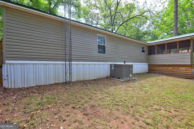 view of home's exterior featuring central air condition unit