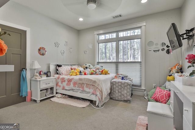 carpeted bedroom featuring recessed lighting, a ceiling fan, and visible vents