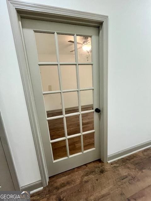 doorway to outside with wood finished floors
