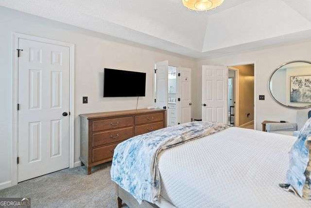 3376 Hickory Ln, Powder Springs, GA 30127 - bedroom featuring baseboards and light colored carpet
