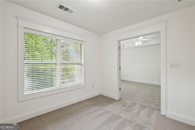655 Mead St SE Unit 58, Atlanta, GA 30312 - carpeted empty room with baseboards and ceiling fan