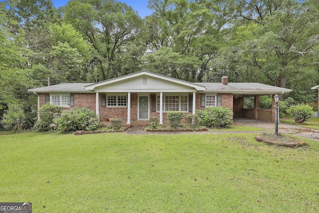 single story home featuring a porch, a front lawn, a chimney, and concrete driveway