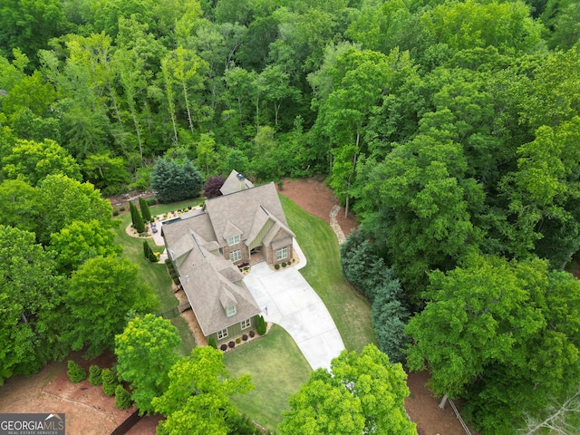 bird's eye view with a forest view
