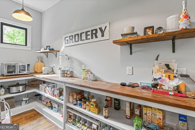 pantry featuring a toaster
