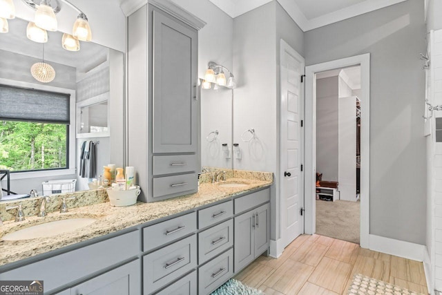 full bath with double vanity and a sink