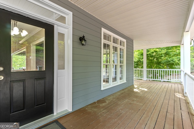 entrance to property with covered porch