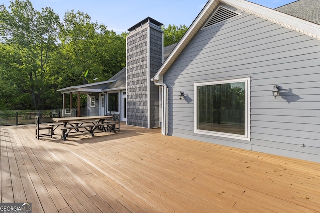 deck with outdoor dining space