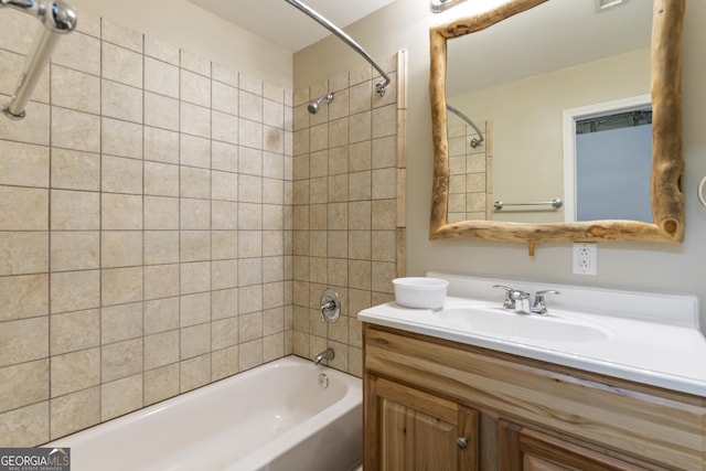 bathroom with vanity and bathtub / shower combination