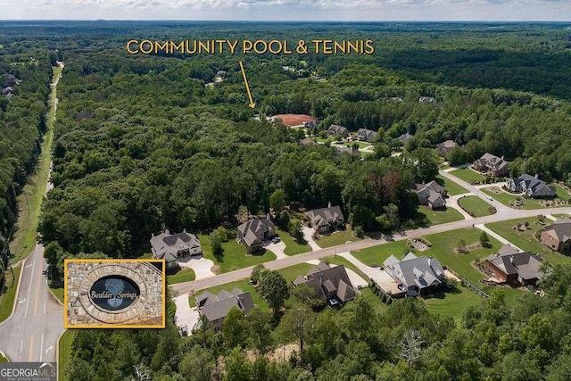 bird's eye view with a view of trees and a residential view