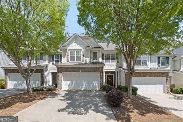 441 Mountain View Ln, Woodstock, GA 30188 - view of property with a garage, board and batten siding, driveway, and stone siding