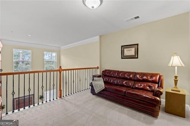 441 Mountain View Ln, Woodstock, GA 30188 - carpeted living room featuring visible vents and crown molding