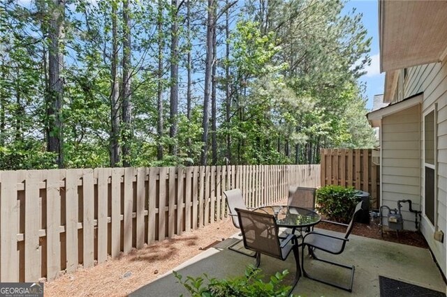 441 Mountain View Ln, Woodstock, GA 30188 - view of patio featuring fence and outdoor dining space