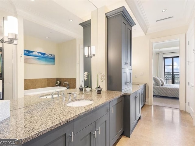 ensuite bathroom with recessed lighting, ornamental molding, ensuite bathroom, and vanity