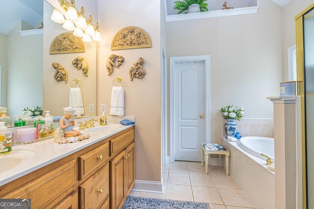 full bath featuring tile patterned flooring, double vanity, and a bath