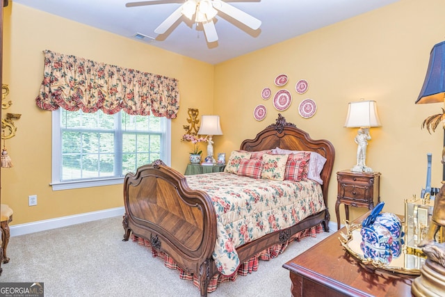 bedroom featuring carpet floors, baseboards, and ceiling fan