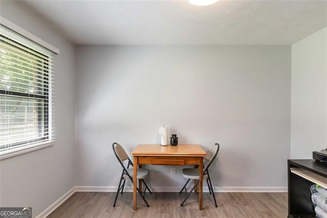 2469 Silver King Dr, Grayson, GA 30017 - dining room with baseboards and wood finished floors